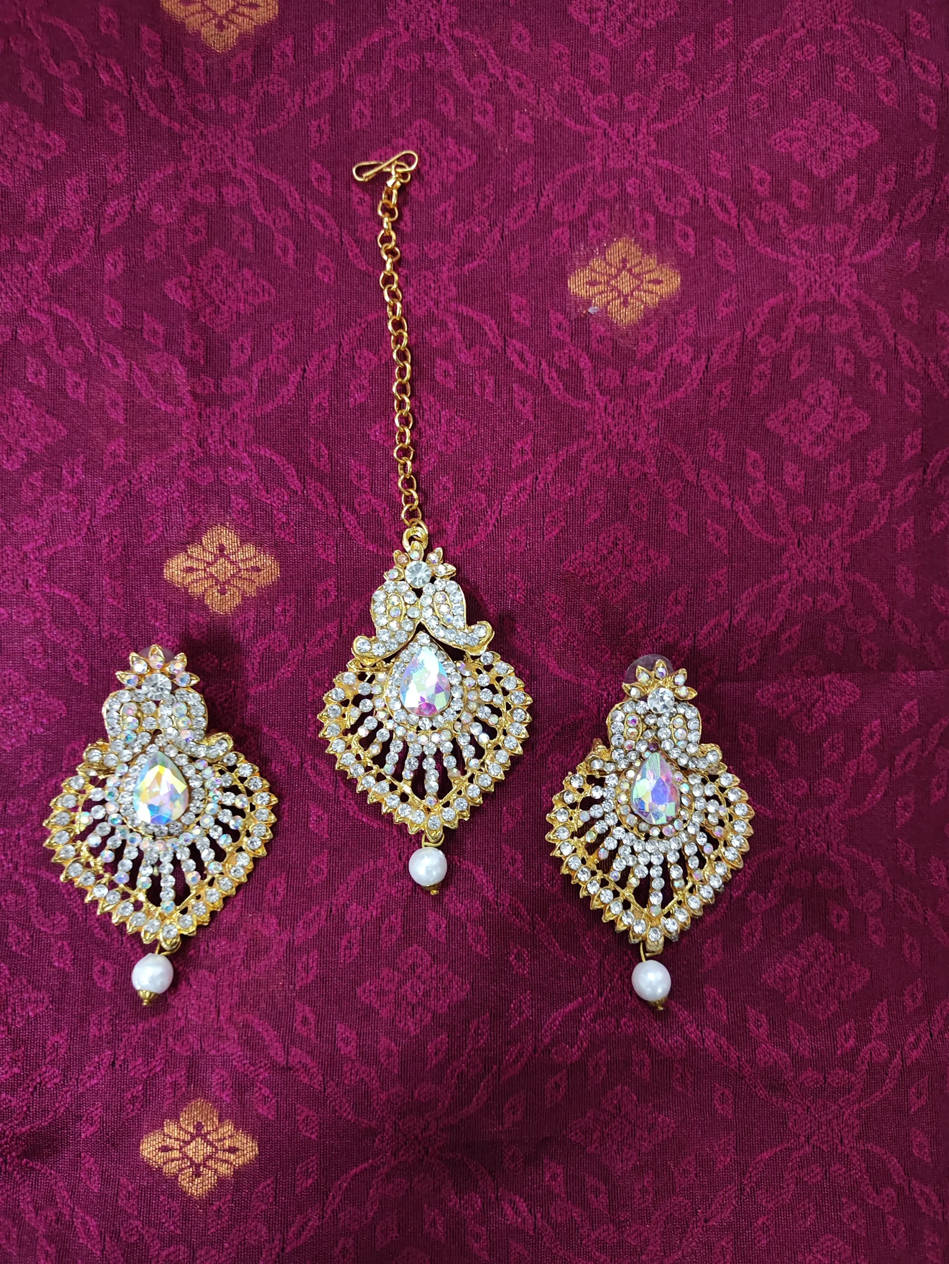 Handcrafted Geometric Kemp Stone Bell Earrings in Antique Finish Handcrafted Geometric Kemp Stone Bell Earrings - Image 1